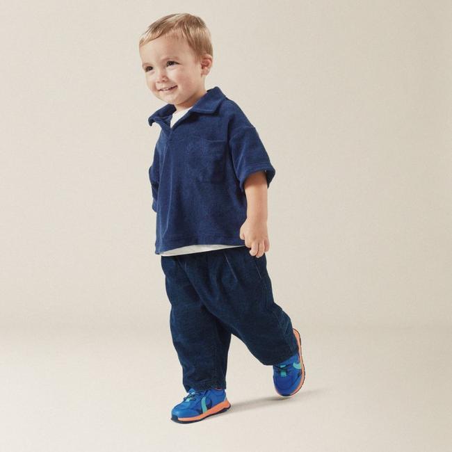 Boy walking wearing First shoes Selva hero